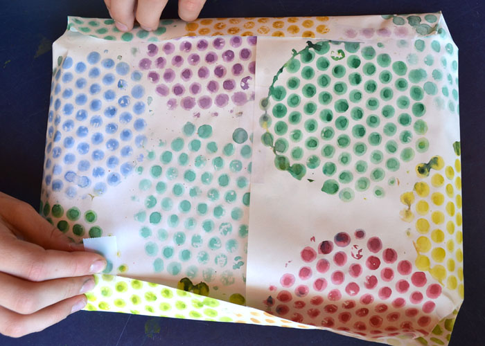 kids make wrapping paper from bubble wrap printing