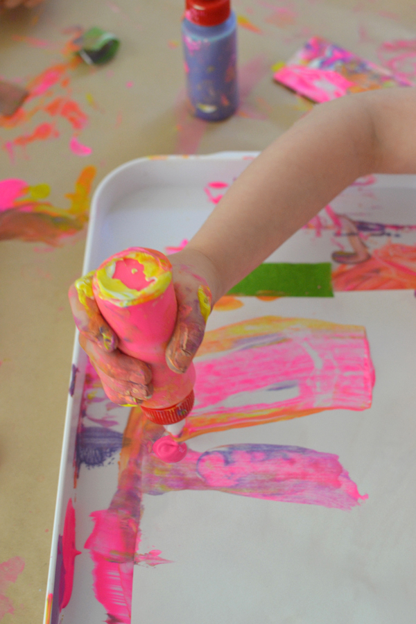 beautiful process art ~ kids love pushing and pulling and scraping the paint around in their tray ~ mixing colors and seeing what will happen is one big art experiment and so much fun!