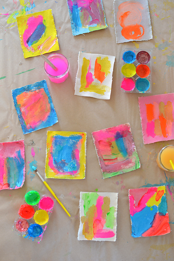 kids love painting on new materials ~ here kids use tempera paints to create little works of art