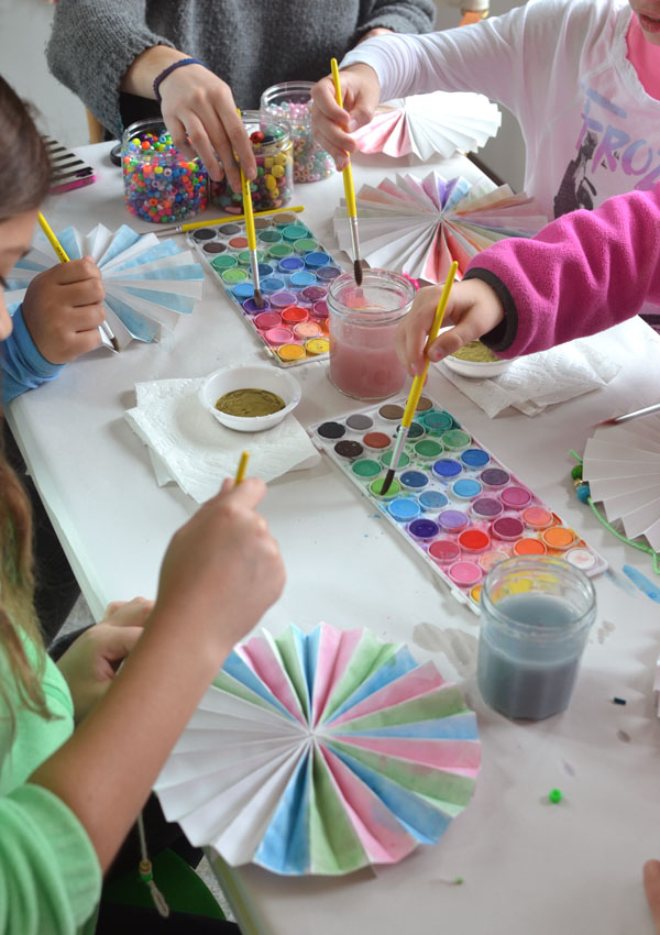 paper pinwheels made to be painted as a birthday party craft