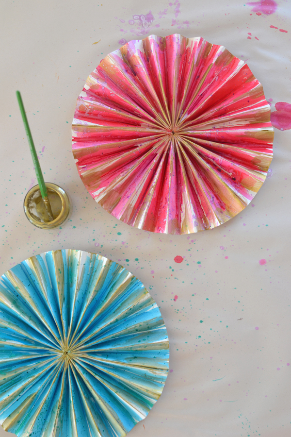 make paper pinwheels and paint them with watercolors