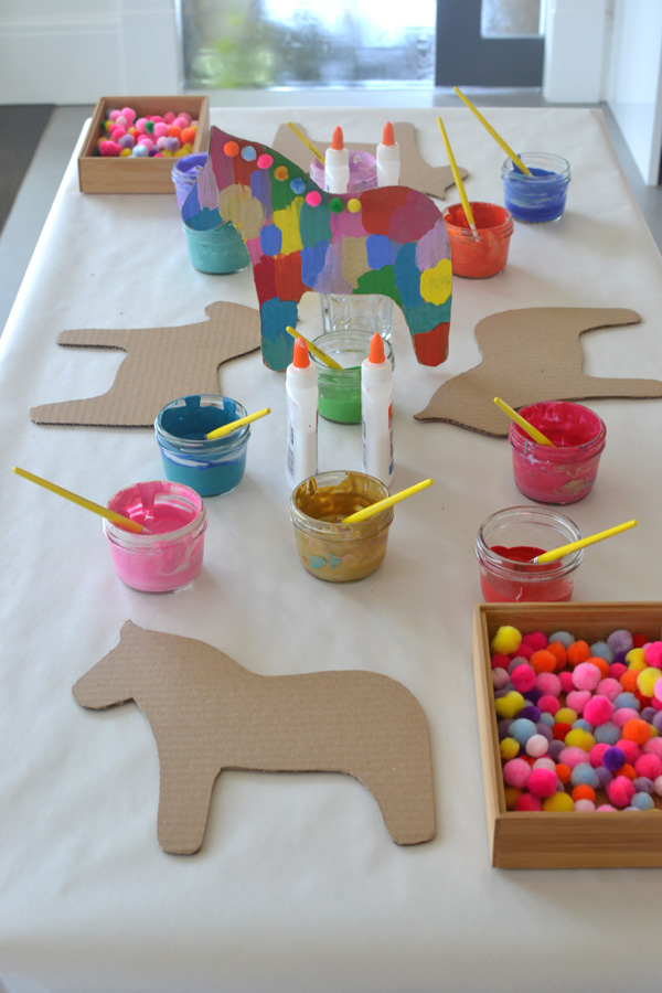 Cut Dala horse shapes from cardboard and let the kids paint and embellish - perfect party craft