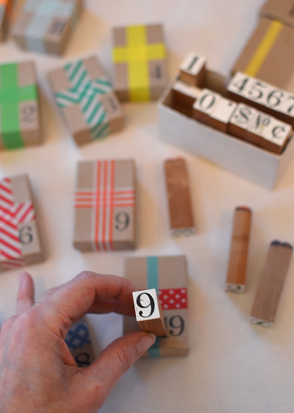 Create an advent calendar using little jewelry boxes and a little tree