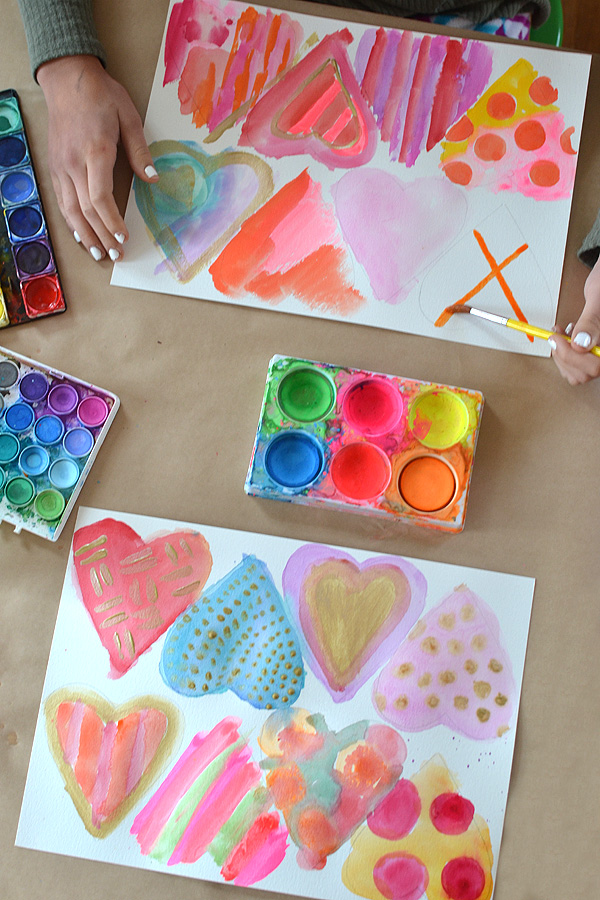 This is the simple and quick way we make watercolor hearts in our house that have a clean edge.