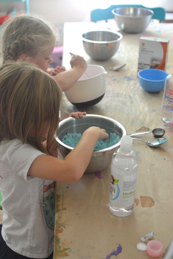 Kids make fizzing bath dough with three simple ingredients.