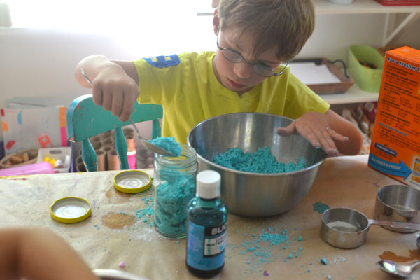 Kids make fizzing bath dough with three simple ingredients.