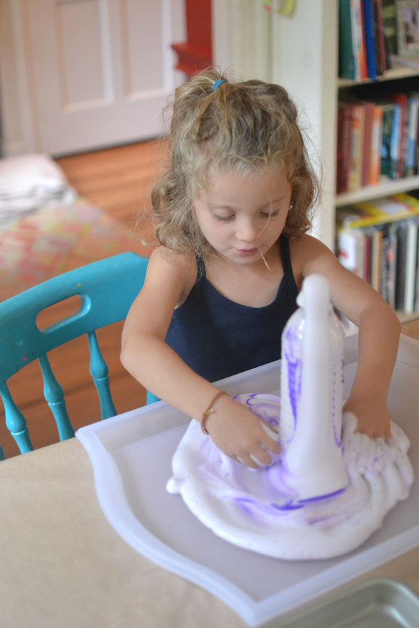 Kids make a fizzing science concoction called "Elephant's Toothpaste"