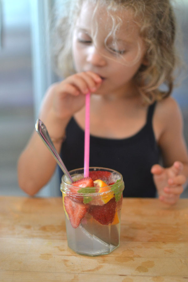 Set out a fruit and seltzer bar and kids can make their own fizzy concoctions.