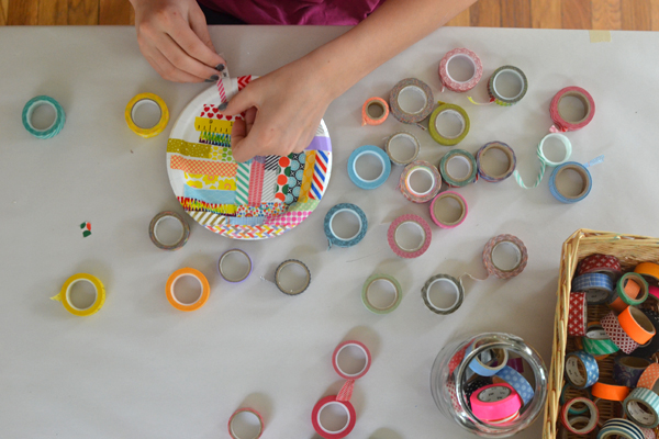 Transform a paper plate into a work of art with colorful washi tape.