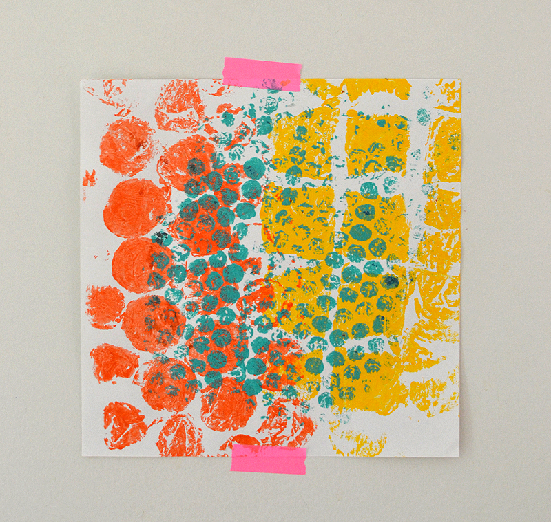 Kids use rollers and tempera paint to make print from the bubble wrap tree