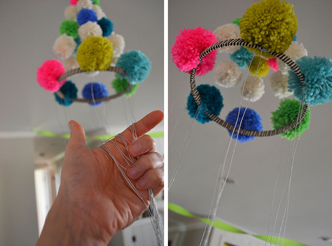 Make a traditional Polish Pujaki, but with pom-poms instead of paper.