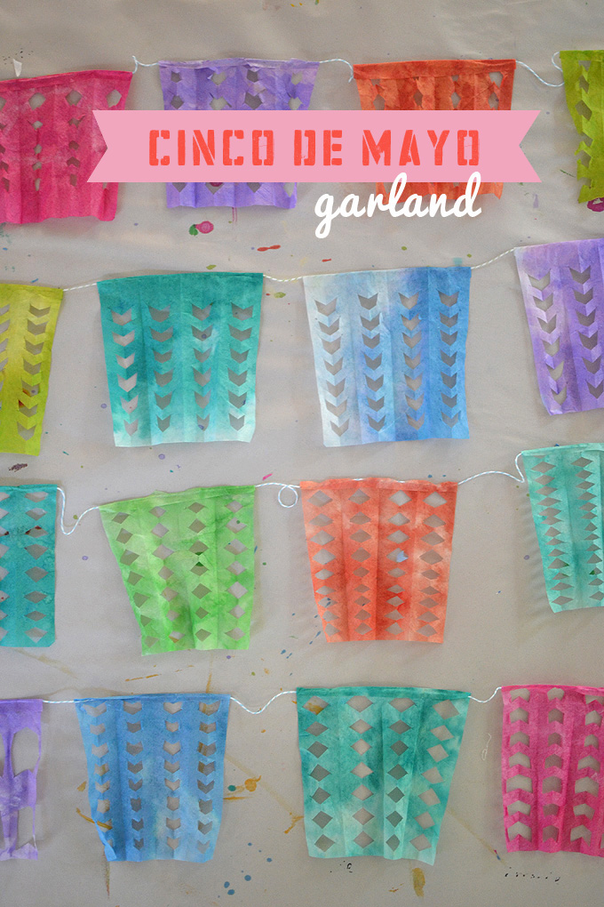Kids paint and cut coffee filters to make Cinco de Mayo paper garland.