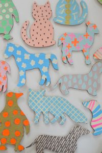 Make animals made from cardboard boxes and paint with patterns. Free animal templates included.