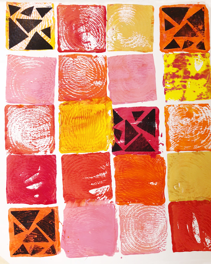 Children make prints using wooden blocks and a raised surface, called a collagraph. 