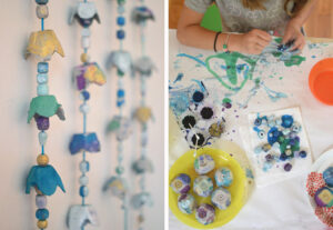 egg cartons craft painted with liquid watercolor and a child painting egg craton pieces with liquid watercolor paints
