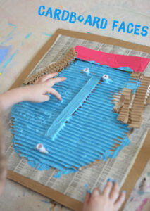 kids make giant faces with corrugated cardboard and tempera paint