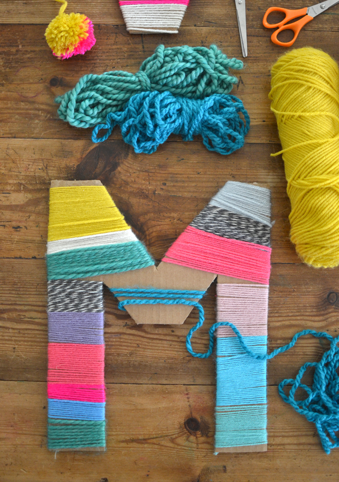 Use yarn to wrap cardboard letters and create a beautiful work of art. Great for children to adults.