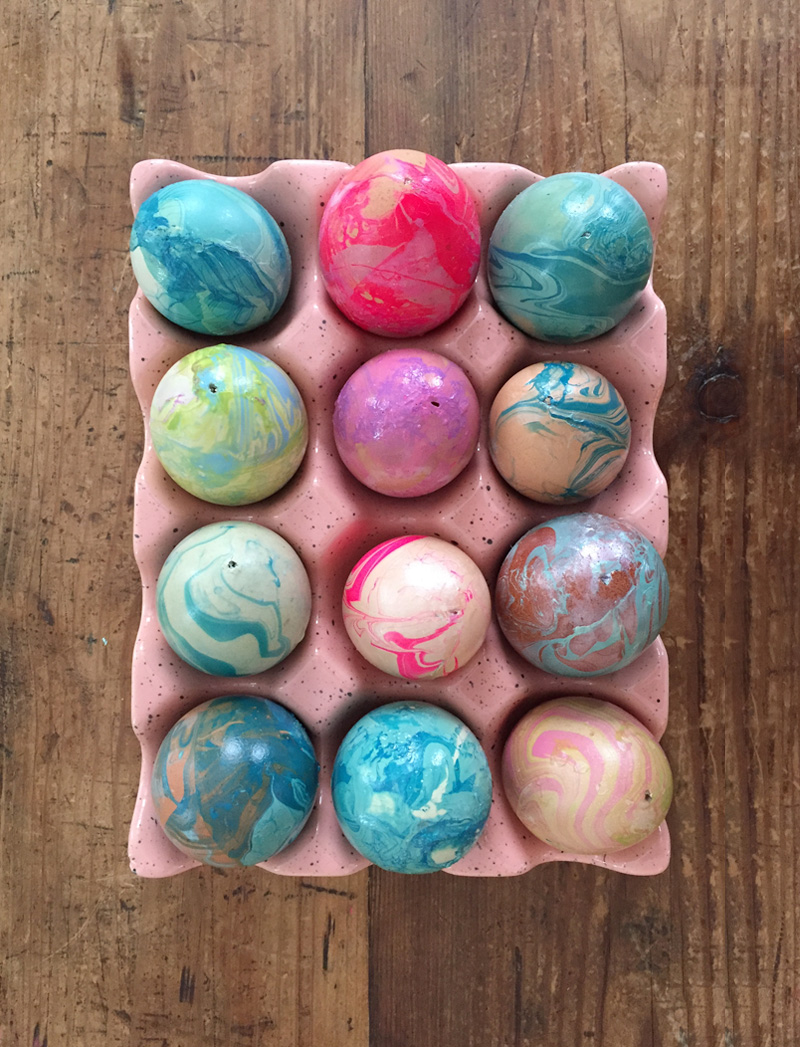 Hollowed out eggs, marbleized with nail polish