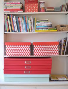 Use big boxes to store your child's art.