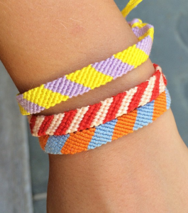 Make friendship bracelets with embroidery floss. Old school craft for teens and tweens.