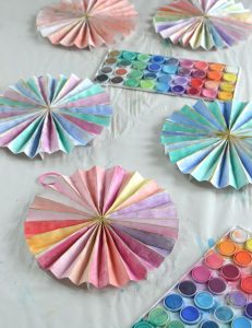 Make paper pinwheels and paint with watercolors. Great art activity for teens and tweens.