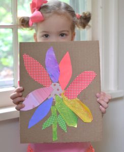 Kids make rainbow flowers and practice their cutting skills.