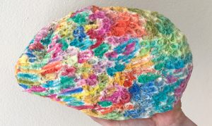 Coral found on the beach is transformed into art with a little watercolor.