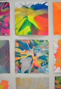 Make spin art with kids then hang them on the wall to make a really cool backdrop.