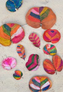Paint leaves with water soluble crayons.