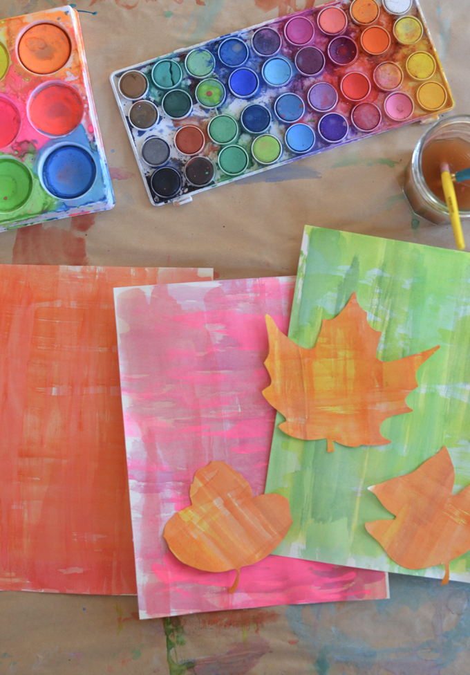DIY leaf placecards for Thanksgiving made with watercolors and free printable stencils.