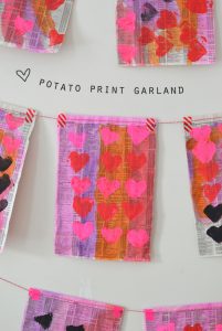 Potato printing with kids, made into a garland.