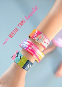 Kids make bracelets from washi tape. A perfect birthday party activity!