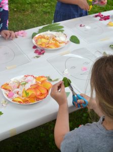 Justina Blakeney's "Face the Foliage" Instagram account inspires kids to make their own portraits from flowers and nature using sticky contact paper.