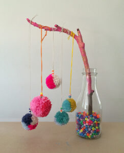 Pom-pom necklaces are a perfect birthday party craft!