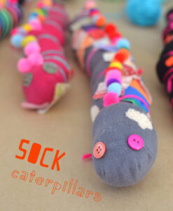 Kids make caterpillars from old socks.