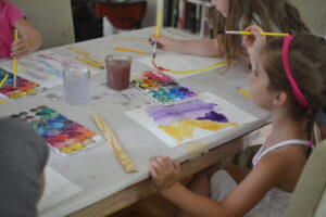 Kids study Swiss artist Paul Klee and create paintings with watercolors and pastels.