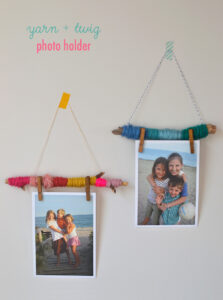 Make easy photo holders to hang on your wall with yarn and twigs.