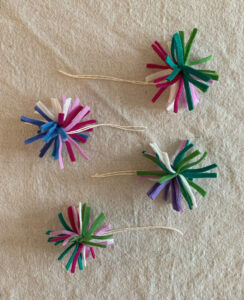 Make pom-poms from small strips of felt, then tie to wire to make a crown.
