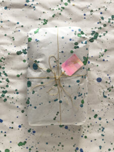 Make your own wrapping paper with butcher paper and tempera paint or watercolors! It's quick and easy and so gorgeous.