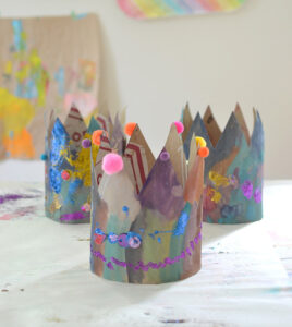 Make birthday crowns from a paper grocery bag.