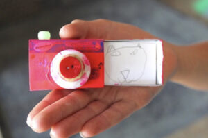 Make a tiny camera from a matchbox.
