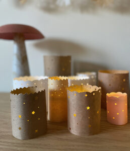 Make simple paper luminaries with paper bags and LED candles.