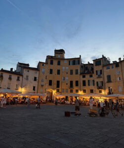 Plaze del Anfiteatro at night in Lucca, Italy