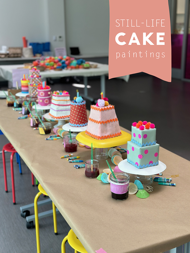 Cakes made from recycled materials, paper, felt, and pom-poms.