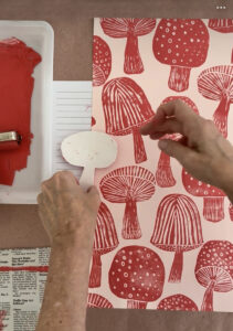 Adding the last styrofoam mushroom to the printed pattern.