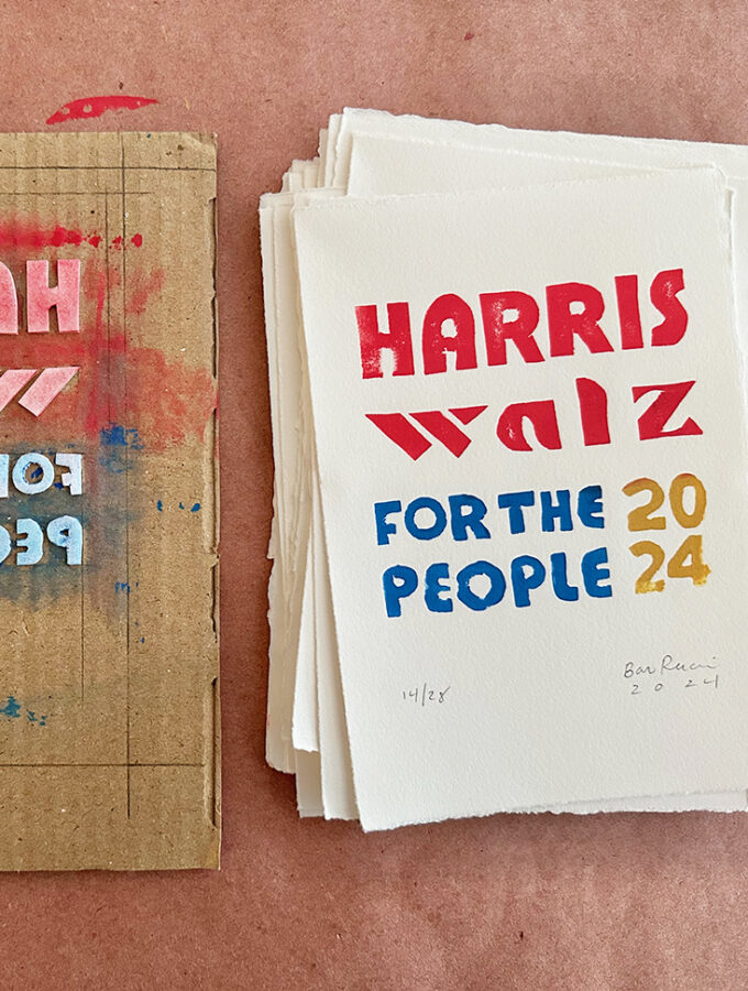 Harris Walz handmade prints in a stack next to a printing plate